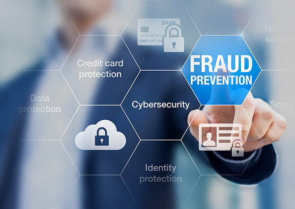 man pointing to overlaid word that reads Fraud Prevention